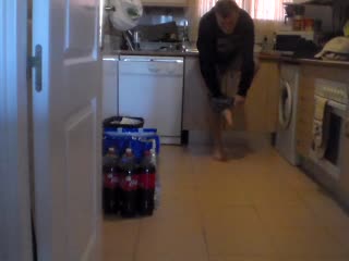 John is Pissing all over the Kitchen Floor